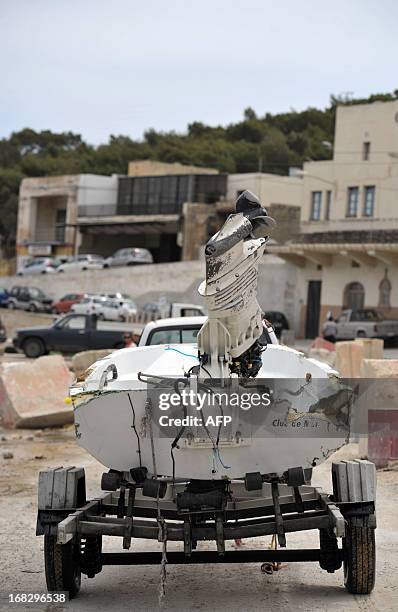 The dinghy belonging to the motor yacht "El Pirata" is pictured after being brought ashore on May 8, 2013 at Mgarr harbor in Gozo, one of three...
