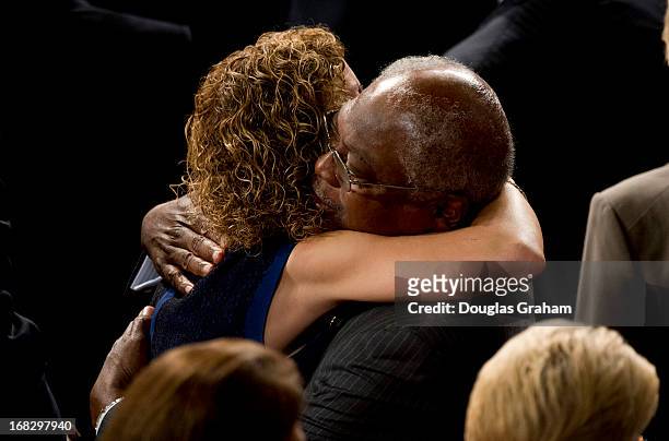 May 8 : Rep. Debbie Wasserman Schultz, D-Fl., gives Rep. James Clyburn, D-SC., a big hug before the start of the joint session of Congress in the...