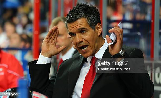 Manny Viveiros, head coach of Austria gives instructions during the IIHF World Championship group H match between Austria and Germany at Hartwall...