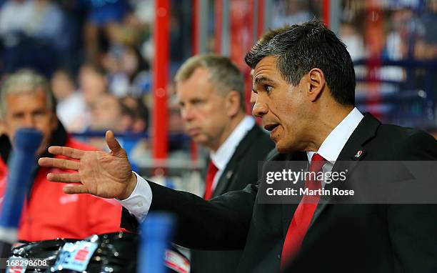 Manny Viveiros, head coach of Austria gives instructions during the IIHF World Championship group H match between Austria and Germany at Hartwall...