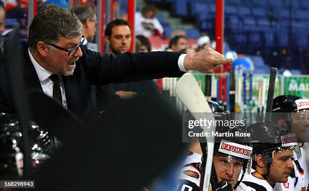 Pat Cortina, head coach of Germany gives instructions during the IIHF World Championship group H match between Austria and Germany at Hartwall Areena...