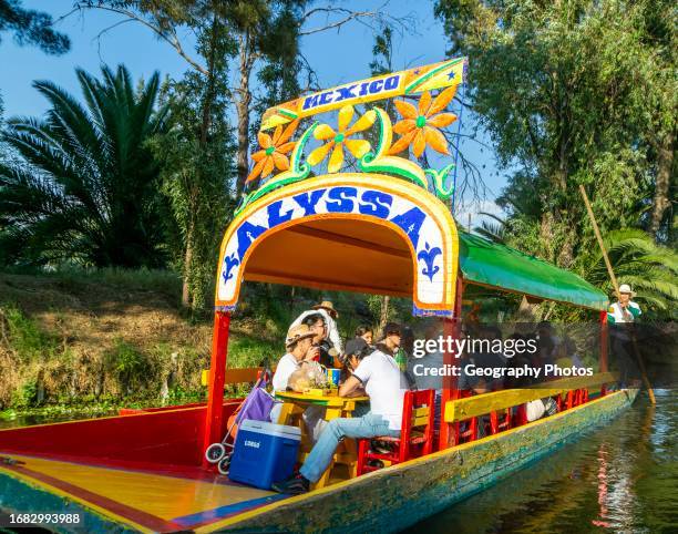 Popular tourist attraction boating Xochimiloco, Mexico City, Mexico.