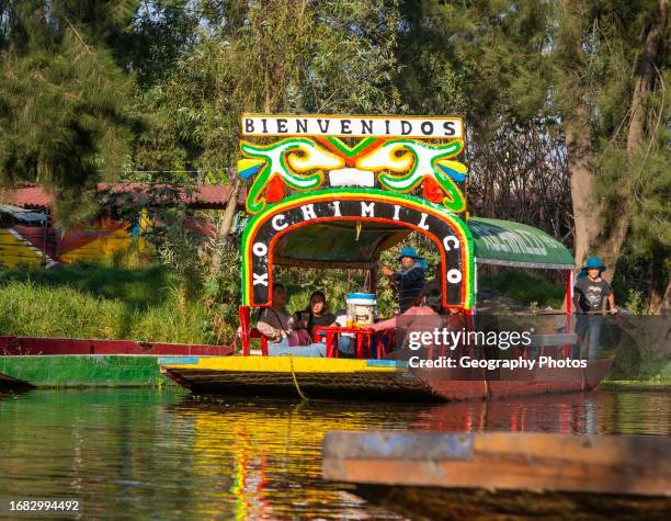 Popular tourist attraction boating Xochimiloco, Mexico City, Mexico.