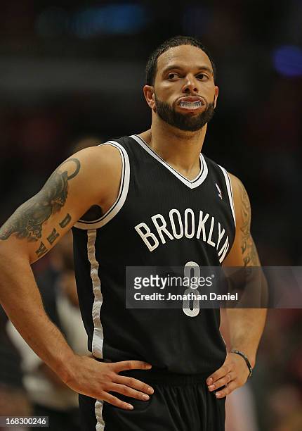 Deron Williams of the Brooklyn Nets reacts in the final minute of triple overtime against the Chicago Bulls in Game Five of the Eastern Conference...
