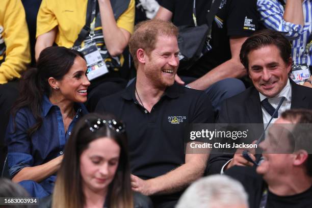 Meghan, Duchess of Sussex, Prince Harry, Duke of Sussex and Johnny Mercer attend the sitting volleyball finals at the Merkur Spiel-Arena during day...