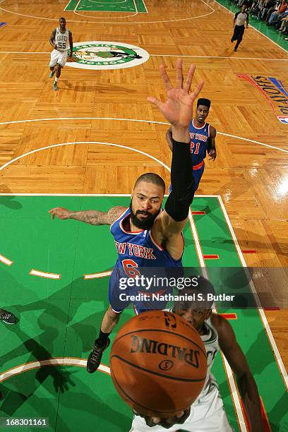 Tyson Chandler of the New York Knicks attemts to block a shot against the Boston Celtics in Game Four of the Eastern Conference Quarterfinals during...