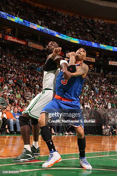 Kenyon Martin of the New York Knicks fights for positioning against Kevin Garnett of the Boston Celtics in Game Four of the Eastern Conference...