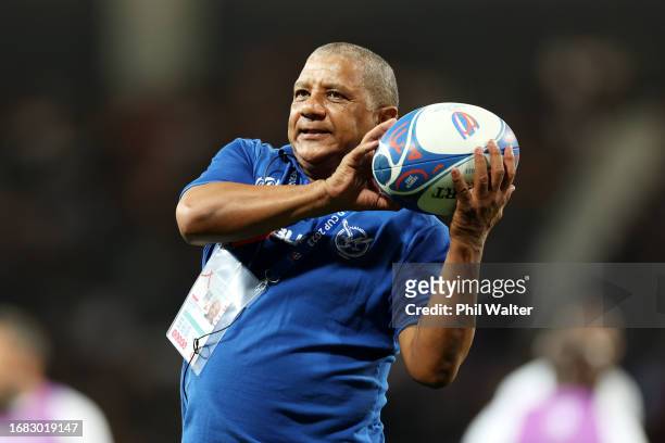 Allister Coetzee, Head Coach of Namibia, catches a ball prior to the Rugby World Cup France 2023 match between New Zealand and Namibia at Stadium de...