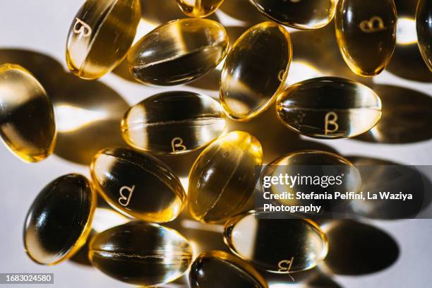 capsules on white background - se stock pictures, royalty-free photos & images