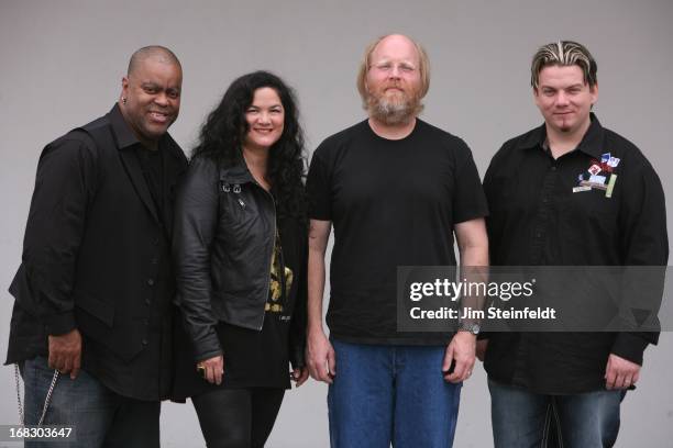 Kelly Moneymaker of the band Expose poses with her new band at the Guitar Center Studios in Woodland Hills, California on April 14, 2013.