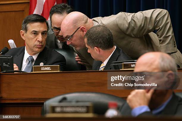 House Oversight and Government Reform Committee Committee Chairman Darrell Issa hears from his staff during a hearing titled, "Benghazi: Exposing...