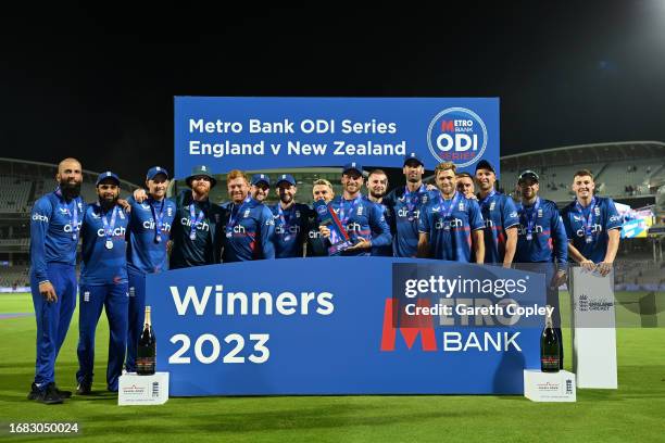 England celebrate with the series trophy after winning the 4th Metro Bank One Day International between England and New Zealand at Lord's Cricket...