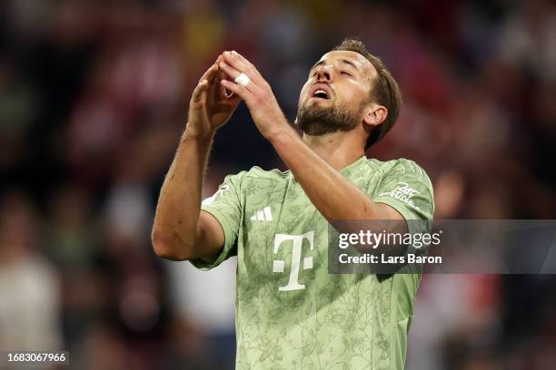 Harry Kane of Bayern Munich reacts during the Bundesliga match between FC Bayern München and Bayer 04 Leverkusen at Allianz Arena on September 15,...