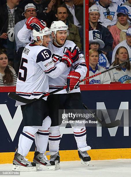 Craig Smith of USA celebrate with team mate Paul Stastny after he scores his team's 4th goal during the IIHF World Championship group H match between...