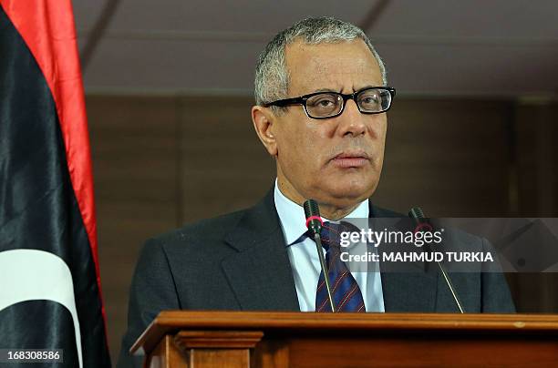 Libyan Prime Minister Ali Zeidan gives a press conference on May 8, 2013 in Tripoli, Libya. Zeidan announced a cabinet reshuffle "in the coming...