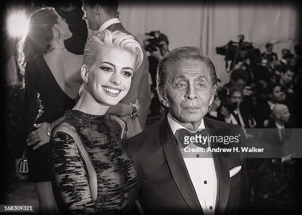 Image has been digitally processed and converted to black and white] Anne Hathaway and Valentino Garavani attend the Costume Institute Gala for the...