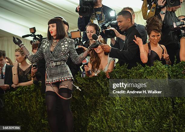 Madonna attends the Costume Institute Gala for the "PUNK: Chaos to Couture" exhibition at the Metropolitan Museum of Art on May 6, 2013 in New York...