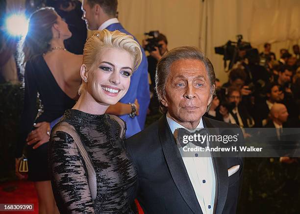 Anne Hathaway and Valentino Garavani attend the Costume Institute Gala for the "PUNK: Chaos to Couture" exhibition at the Metropolitan Museum of Art...
