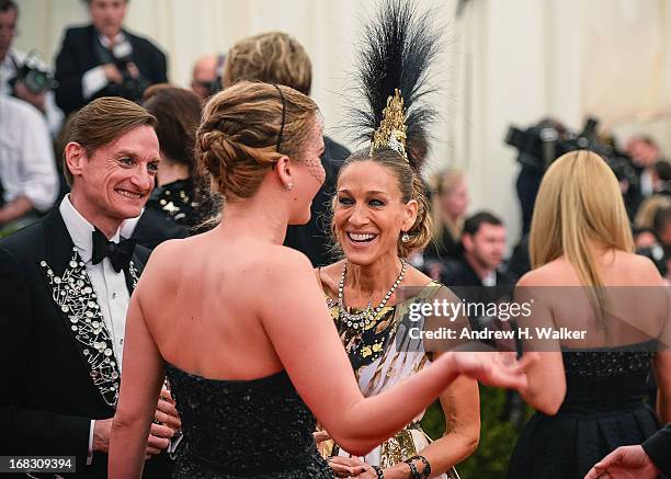 Hamish Bowles, Jennifer Lawrence, and Sarah Jessica Parker attend the Costume Institute Gala for the "PUNK: Chaos to Couture" exhibition at the...