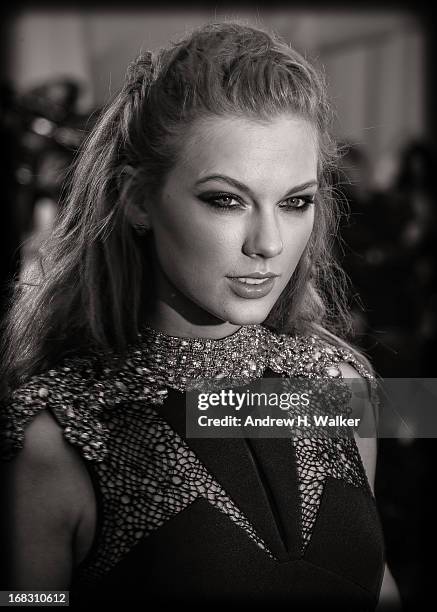 Image has been digitally processed and converted to black and white] Taylor Swift attends the Costume Institute Gala for the "PUNK: Chaos to Couture"...