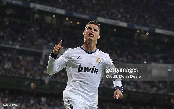 Cristiano Ronaldo of Real Madrid CF celebrates after scoring Real's second goal during the La Liga match between Real Madrid CF and Malaga CF at...