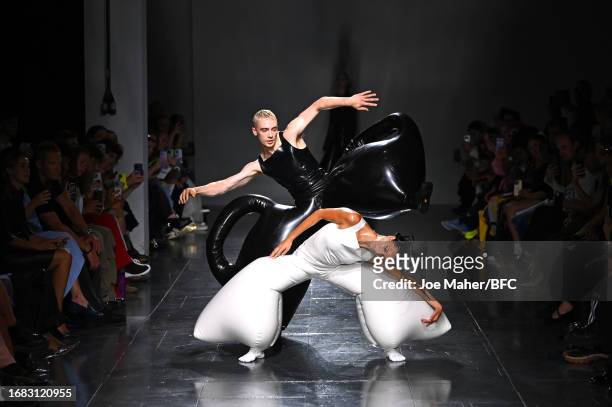 Models perform on the runway at the Harri show during London Fashion Week September 2023 at the Old Selfridges Hotel on September 15, 2023 in London,...