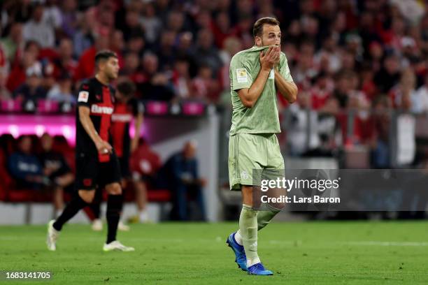 Harry Kane of Bayern Munich reacts during the Bundesliga match between FC Bayern München and Bayer 04 Leverkusen at Allianz Arena on September 15,...