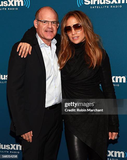 President and Chief Content Officer of Sirius XM Radio, Scott Greenstein and Jennifer Lopez visit at SiriusXM Studios on May 8, 2013 in New York City.