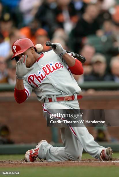 Ben Revere of the Philadelphia Phillies ducks out of the way of a close pitch thrown by Barry Zito of the San Francisco Giants in the third inning at...