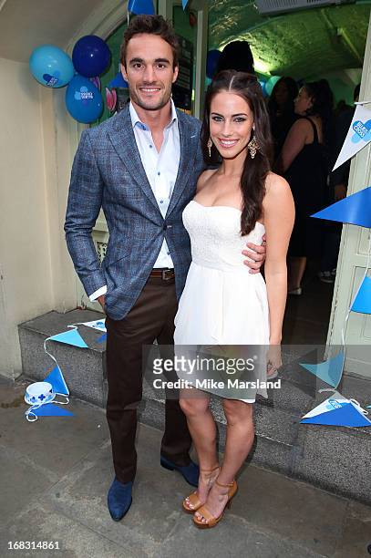 Thom Evans and Jessica Lowndes attend the Blue Cross tea party on May 8, 2013 in London, England.