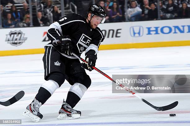 Jake Muzzin of the Los Angeles Kings skates with the puck against the St. Louis Blues in Game Three of the Western Conference Quarterfinals during...