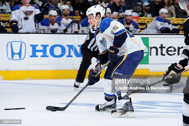 Chris Stewart of the St. Louis Blues skates with the puck against the Los Angeles Kings in Game Three of the Western Conference Quarterfinals during...