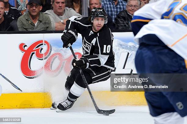 Mike Richards of the Los Angeles Kings skates with the puck against the St. Louis Blues in Game Three of the Western Conference Quarterfinals during...