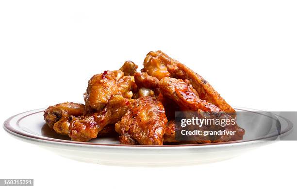 chicken wings isolated on white - plate of buffalo wings stock pictures, royalty-free photos & images