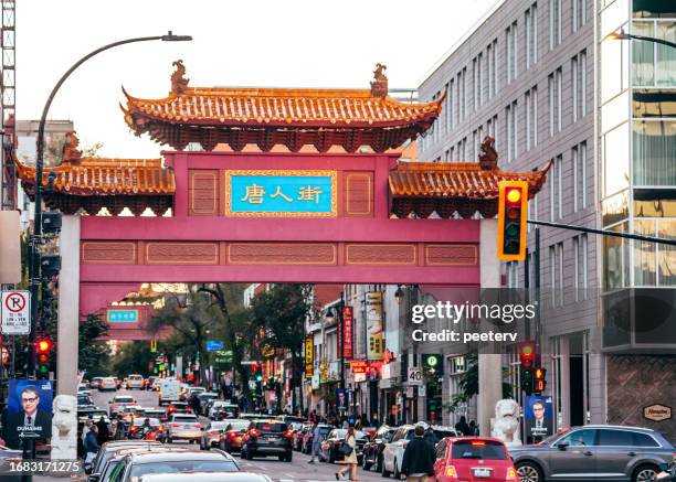 chinatown, montreal evening traffic - vieux montréal stock pictures, royalty-free photos & images