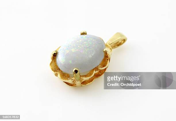 opal pendant on gold - opal gemstone stock pictures, royalty-free photos & images