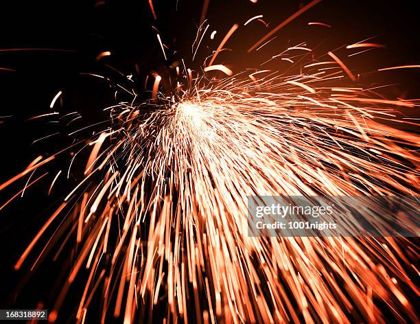 sparks and fireworks - sparks fly stock pictures, royalty-free photos & images