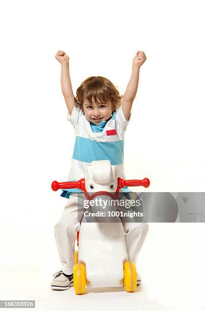 adorable little boy - horses playing stock pictures, royalty-free photos & images