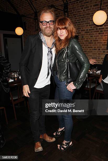 Johan Lindeberg and Kim Sion attend the BLK DNM Dinner with Johan Lindeberg and Kim Sion at Beagle Restaurant on May 8, 2013 in London, England.