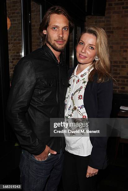 James Rousseau and Annabelle Wallis attend the BLK DNM Dinner with Johan Lindeberg and Kim Sion at Beagle Restaurant on May 8, 2013 in London,...