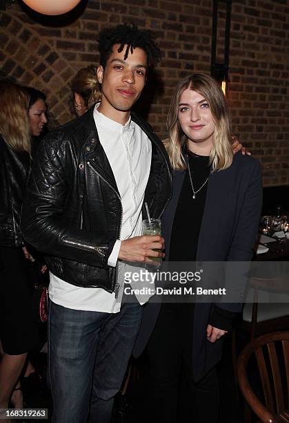 Sean Frank and Aurelia Donaldson attend the BLK DNM Dinner with Johan Lindeberg and Kim Sion at Beagle Restaurant on May 8, 2013 in London, England.
