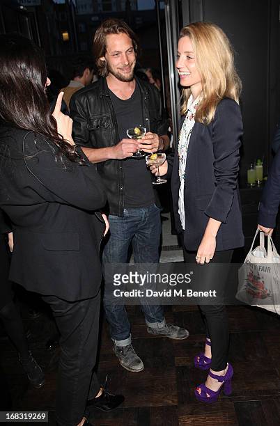 James Rousseau and Annabelle Wallis attend the BLK DNM Dinner with Johan Lindeberg and Kim Sion at Beagle Restaurant on May 8, 2013 in London,...