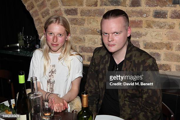 Anders C Madsen and Alice Goddard attend the BLK DNM Dinner with Johan Lindeberg and Kim Sion at Beagle Restaurant on May 8, 2013 in London, England.