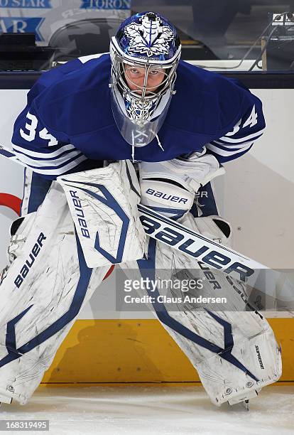 James Reimer of the Toronto Maple Leafs gets ready in the warm-up prior to playing the Boston Bruins in Game Four of the Eastern Conference...