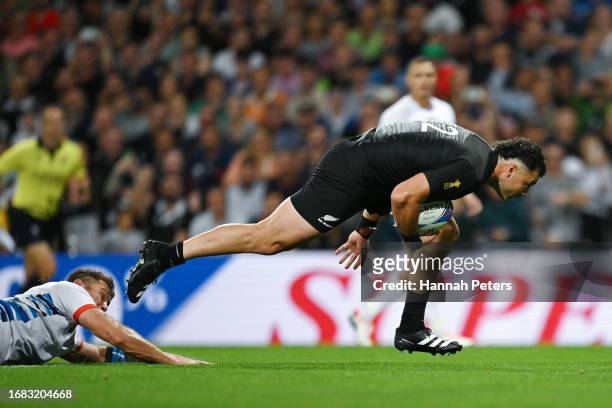 David Havili of New Zealand breaks through to score the team's ninth try during the Rugby World Cup France 2023 match between New Zealand and Namibia...