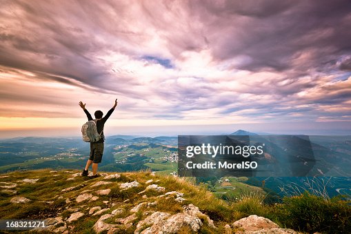 Hiker on top of the Mountain, Success Freedom Concept Hiker on top of the Mountain, Success Freedom Concept