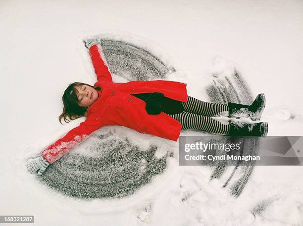 snow angel - red glove stock pictures, royalty-free photos & images