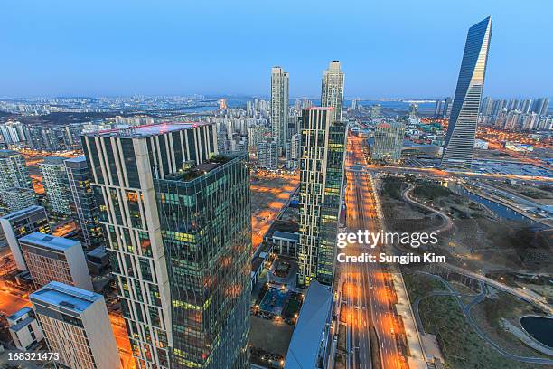 cityscape with skyscrapers - songdo ibd stock pictures, royalty-free photos & images