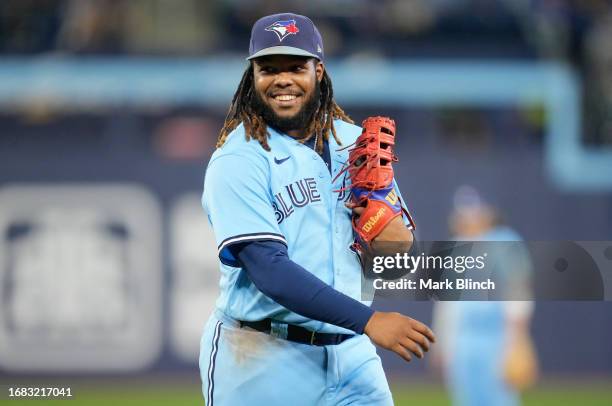 Vladimir Guerrero Jr. #27 of Toronto Blue Jays smiles in a break in play against the Texas Rangers in their MLB game at the Rogers Centre on...