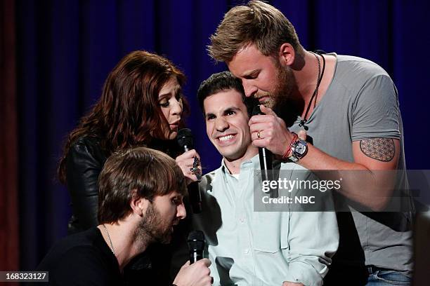 Episode 831 -- Pictured: Musical guests Dave Haywood, Hillary Scott, Charles Kelley of Lady Antebellum serenades an audience member on May 8, 2013 --